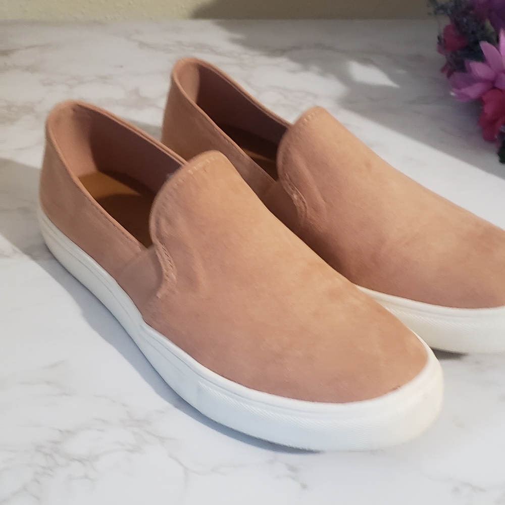 Peach colored canvas sneakers
